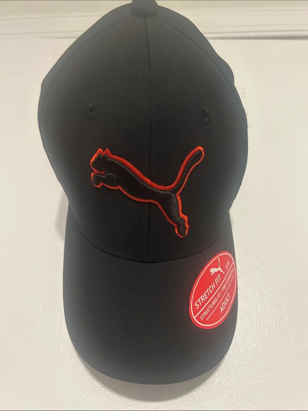 Puma Black Cap with Red Outlined Cat Logo
